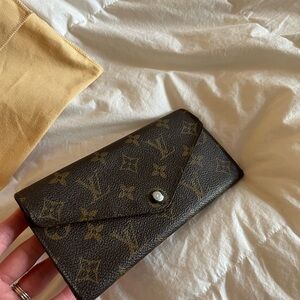 Louis Vuitton Monogram Emilie Wallet in blue, earlier edition